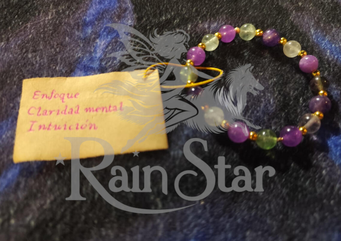 A handcrafted amethyst and fluorite bracelet, designed to support clarity of mind, focused thinking, and intuitive insight.